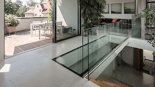 Wohnzimmer mit Ganzglaselement